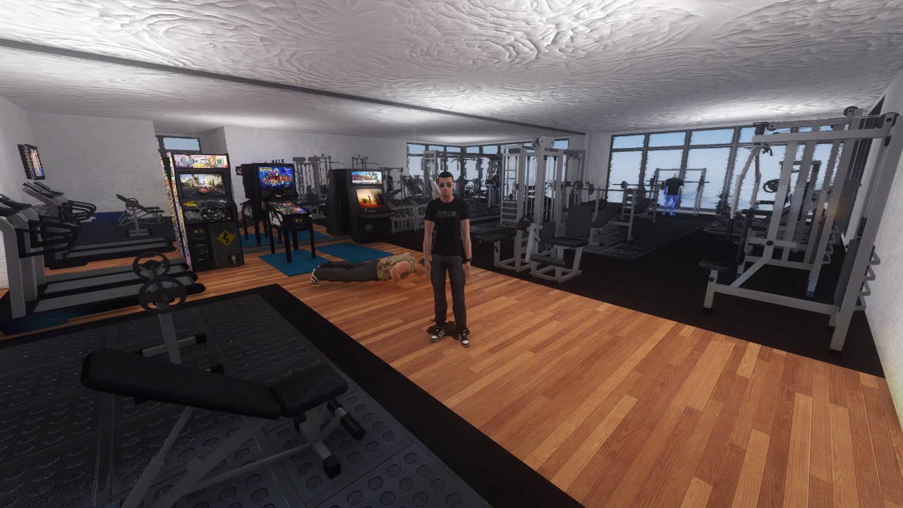 Weight room with mirrors, windows, and custom workout equipment