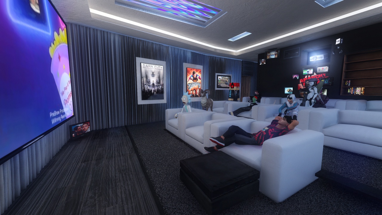 Bright movie theater room with fluffy couches and cabinets