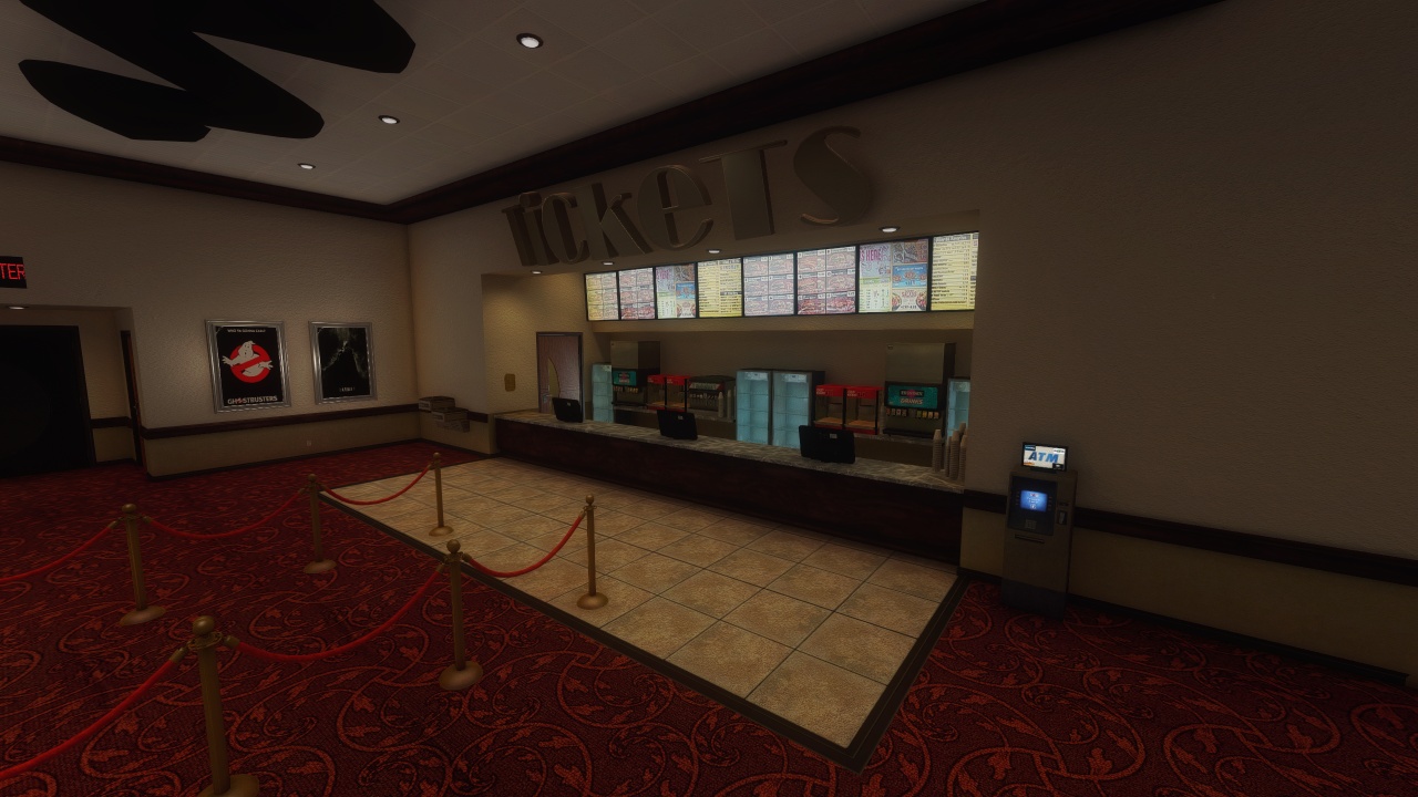 Snack bar with beverage dispensers, popcorn machines, ordering kiosks, and movie posters